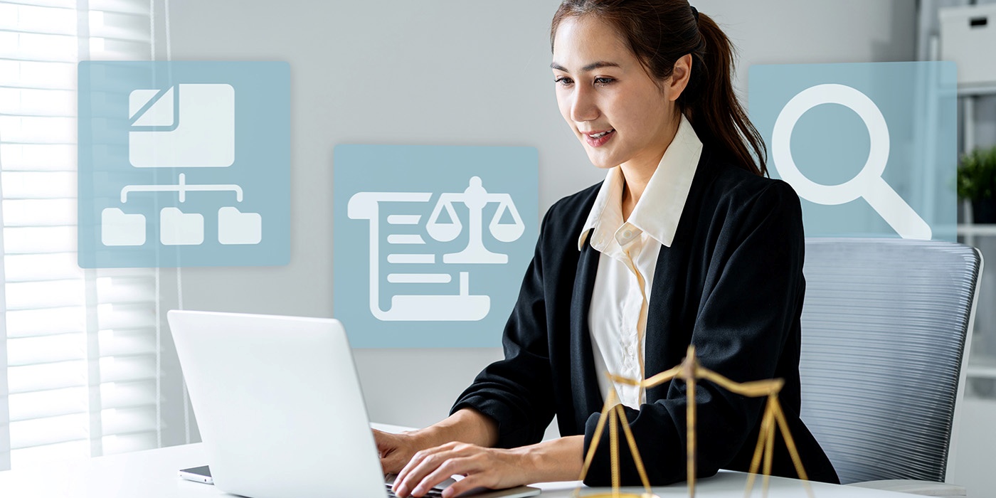 Image of Paralegal working at desk.